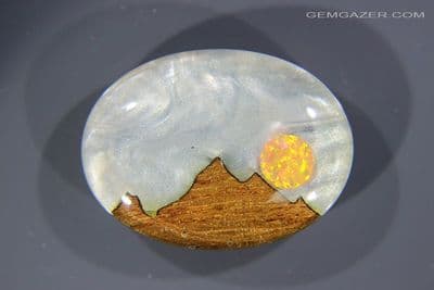 Aurora synthetic Opal, Mother of Pearl triplet cabochon, Australia. 30.76 carats. (Video)