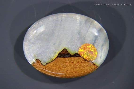 Aurora synthetic Opal, Mother of Pearl triplet cabochon, Australia. 32.31 carats. (Video)