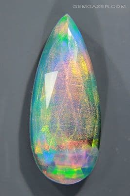 Aurora Synthetic Opal triplet cabochon, Australia. 15.04 carats. (Video)