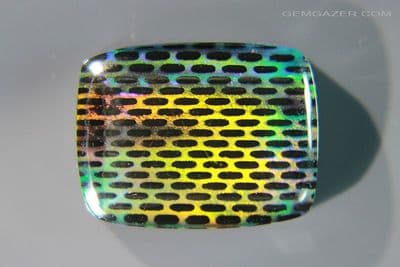 Aurora Synthetic Opal triplet cabochon, Australia. 15.90 carats. (Video)