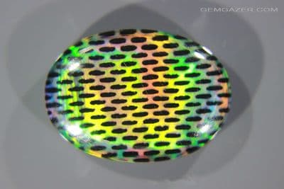 Aurora Synthetic Opal triplet cabochon, Australia. 16.77 carats. (Video)