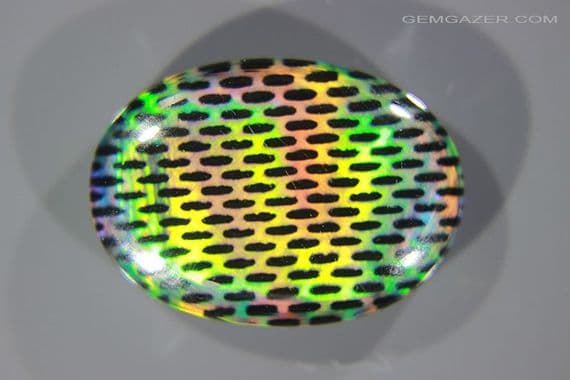 Aurora Synthetic Opal triplet cabochon, Australia. 16.77 carats. (Video)