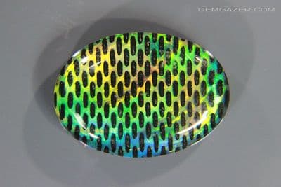Aurora Synthetic Opal triplet cabochon, Australia. 17.82 carats. (Video)