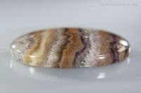 Banded Amethyst in Agate cabochon, Switzerland. 25.22 carats.