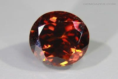 Bastnaesite, burnt-orange faceted, Pakistan. Certificated. 6.70 carats. (Video)