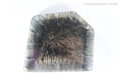 Bi-colour Quartz cabochon with Hematite, Rutile (aka Super 7 Quartz) cabochon, Brazil.  18.83 carats