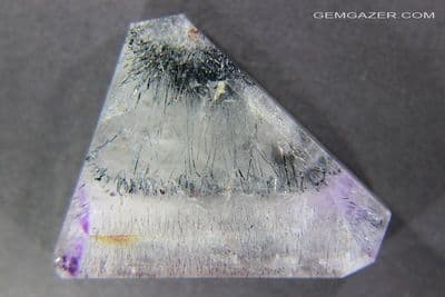 Bi-colour Quartz cabochon with Hematite, Rutile (Super 7 Quartz), Brazil. 52.71 carats.