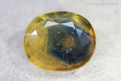 Bi-colour Sapphire, lead glass-filled, faceted, Tanzania. 9.01 carats.