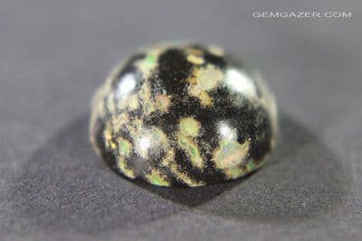 Black Leopard Opal cabochon, Mexico. 6.20 carats.