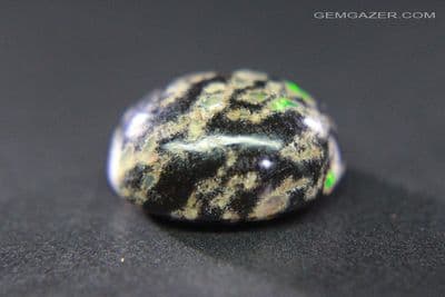 Black Leopard Opal cabochon, Mexico. 9.02 carats. (Video)