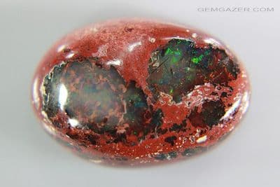 Cantera Fire Opal in matrix cabochon, Mexico. 53.04 carats. (See Video)