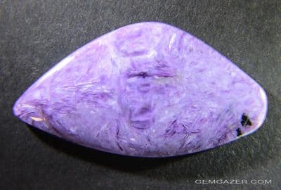 Charoite cabochon.  59.57 carats.