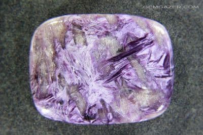 Charoite with Tinkasite cabochon, Russia. 53.14 carats.  ** SOLD **