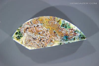 Chrysocolla & Native Copper in Chalcedony cabochon, Indonesia. 47.10 carats. (Video)