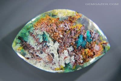Chrysocolla & Native Copper in Chalcedony cabochon, Indonesia. 48.97 carats. (Video)