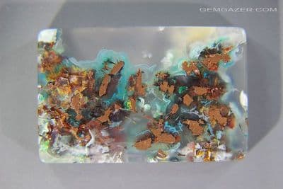 Chrysocolla & Native Copper in Chalcedony cabochon, Indonesia. 59.43 carats. (Video)