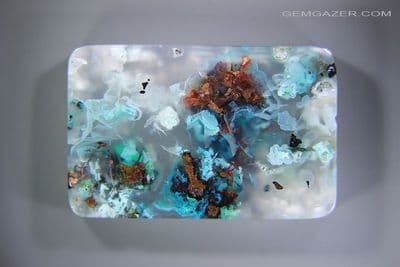 Chrysocolla & Native Copper in Chalcedony cabochon, Indonesia. 63.75 carats. (Video)