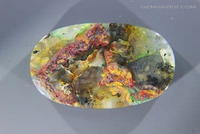 Chrysocolla & Native Copper in Chalcedony cabochon, Indonesia. 65.55 carats. (Video)