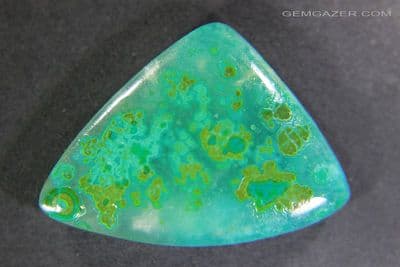 Chrysocolla plumes in Agate cabochon, Arizona USA. 24.72 carats.
