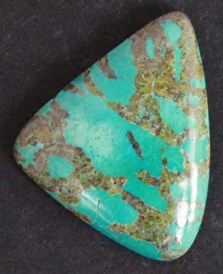 Chrysocolla with Andradite Garnet cabochon, Arizona, USA.   16.58 carats.