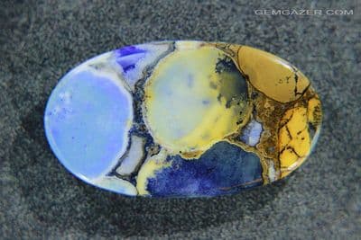 Cobra Jasper cabochon (dyed), India. 41.13 carats.