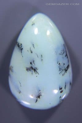 Dendritic blue Opal cabochon, Peru. 7.98 carats.