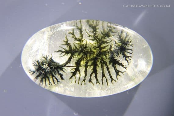 Dendritic Quartz / resin doublet cabochon. 37.58 carats.