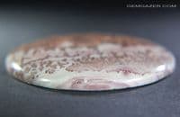 Dendritic Rhyolite cabochon, China. 86.68 carats.