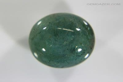 Emerald cabochon, treated-dyed, Zambia. 7.28 carats.