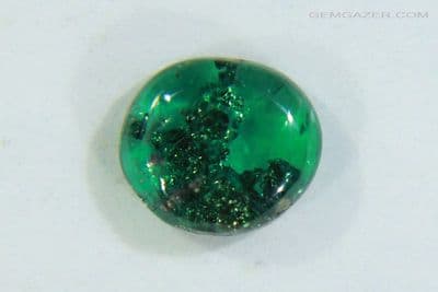 Emerald cabochon with Pyrite crystal inclusions, Colombia. 0.67 carat. (Video)  ** SOLD **