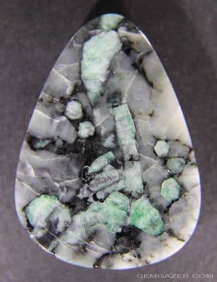 Emerald crystals in Matrix cabochon, Brazil.  154.26 carats.