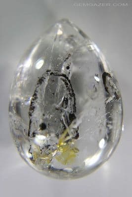 Enhydro Quartz cabochon with moving bubble & black sediment, Madagascar. 36.02 carats. (Video).