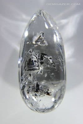 Enhydro Quartz cabochon with moving bubble & black sediment, Madagascar. 60.24 carats. (Video).