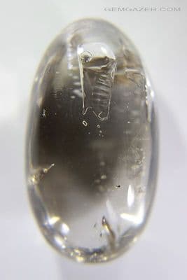 Enhydro Quartz cabochon with moving bubble, Brazil, 58.66  carats. (See video)