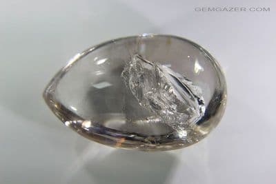 Enhydro Quartz cabochon with negative crystal inclusions, Madagascar. 115.16  carats.