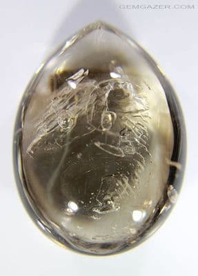 Enhydro Smoky Quartz cabochon with moving bubble, Madagascar. 96.06 carats. (Video)