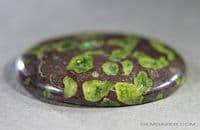 Epidote in Matrix cabochon, Brazil.  38.27 carats.