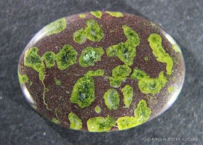 Epidote in Matrix cabochon, Brazil.  38.27 carats.