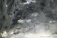 Ettringite, colourless faceted, Germany.  1.30 carats.