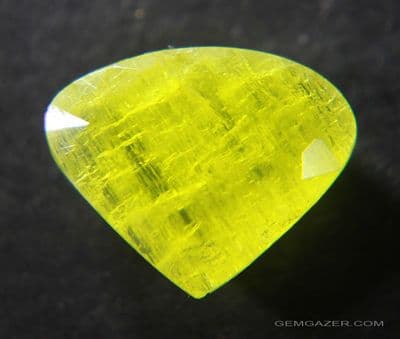 Ettringite, yellow faceted, South Africa.  4.56 carats.