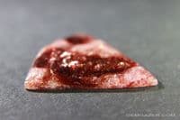 Eudialyte cabochon, Canada.  17.07 carats.