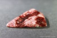 Eudialyte cabochon, Canada.  17.07 carats.