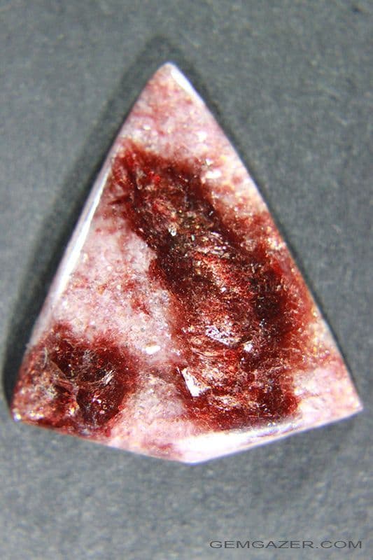 Eudialyte cabochon, Canada.  17.07 carats.