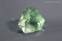 Fluorite, green faceted, fluorescent, County Durham, England. 4.42 carats (Video)