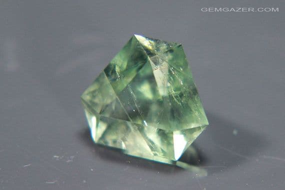 Fluorite, green faceted, fluorescent, County Durham, England. 4.42 carats (Video)