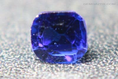 Garnet-topped Doublet, blue faceted. 1.01 carats.  ** SOLD **