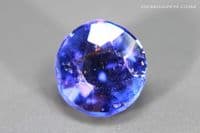 Garnet-topped Doublet, blue faceted. 2.01 carats.  ** SOLD **