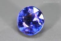 Garnet-topped Doublet, blue faceted. 2.01 carats.  ** SOLD **