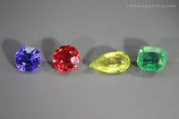 Garnet-topped Doublet colour set, 4 faceted gems. 2.72 carats total weight.  ** SOLD **
