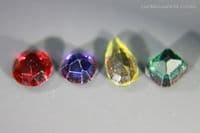 Garnet-topped Doublet colour set, 4 faceted gems. 2.72 carats total weight.  ** SOLD **